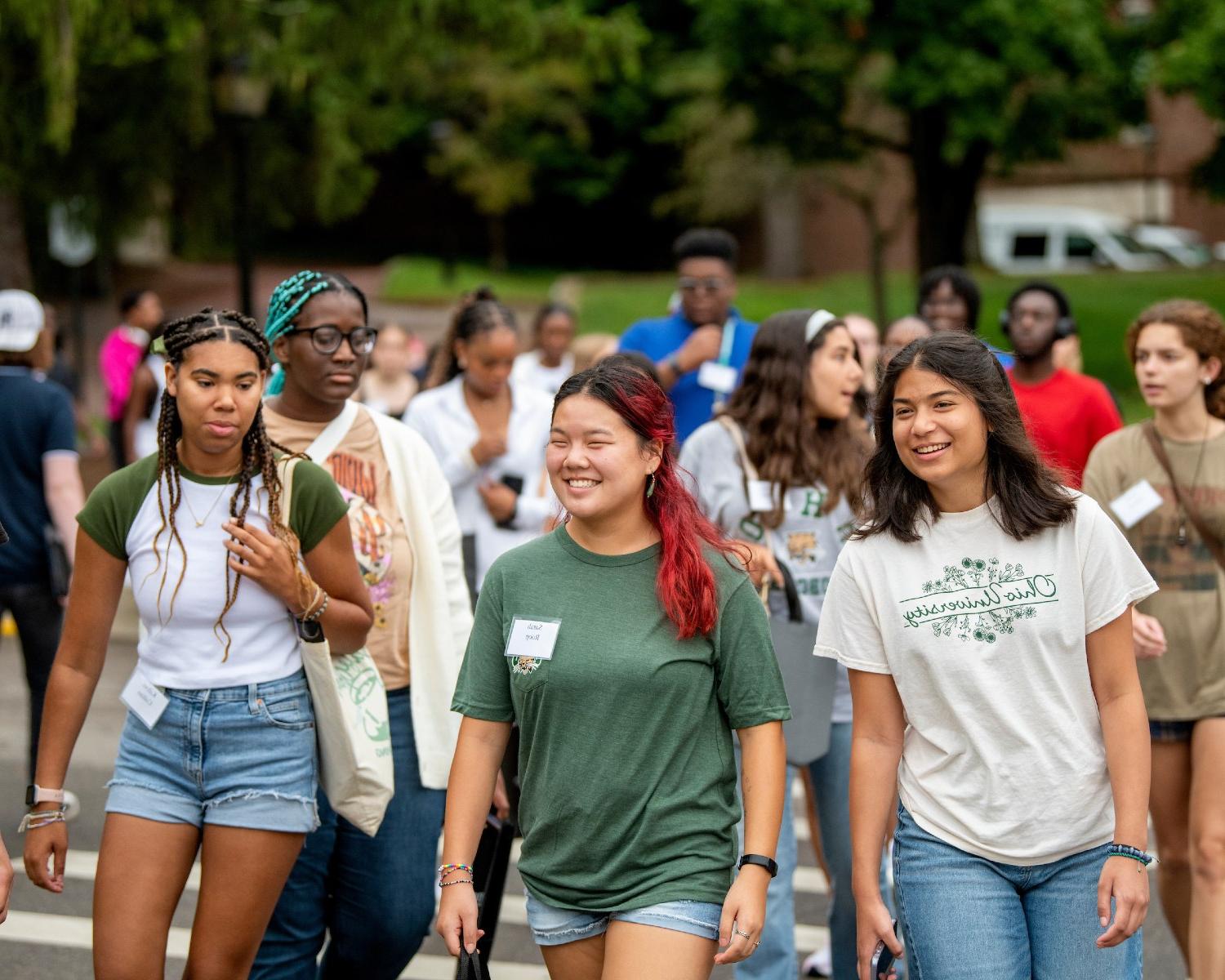 Students walking together during welcome program activity