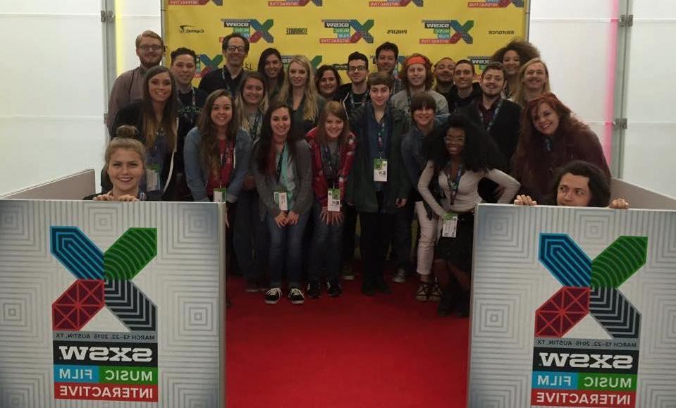 Photo of students gathered on red carpet at South by Southwest festival