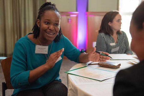 Individuals discuss at Women's Meet and Greet 2019 