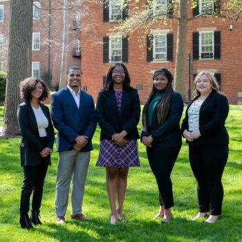 Members of the Student Cabinet for Inclusive Excellence pose on College Green